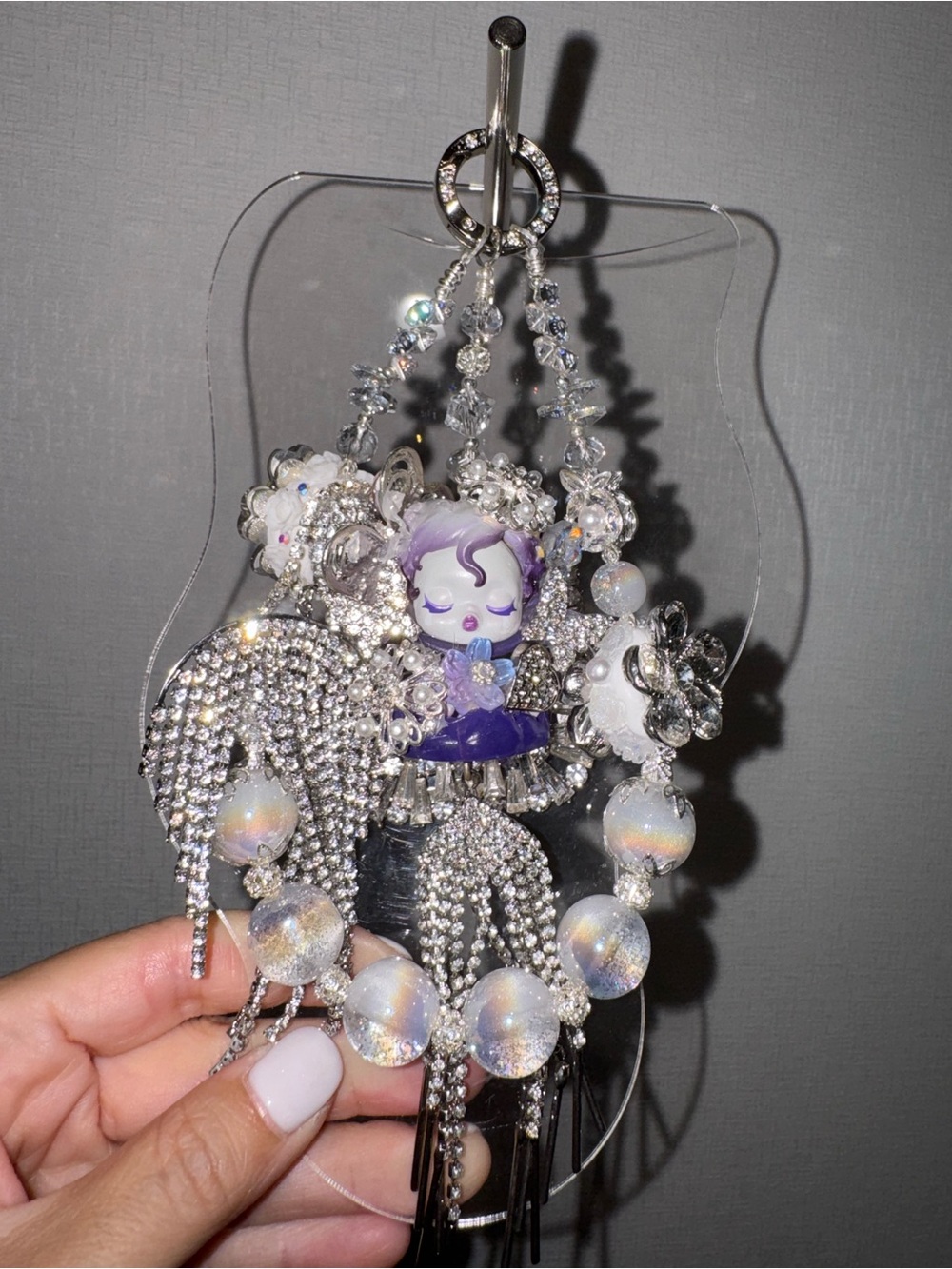 Popmart’s skullpanda Silver and Purple Charm Keychain Decorative Bag Accessory